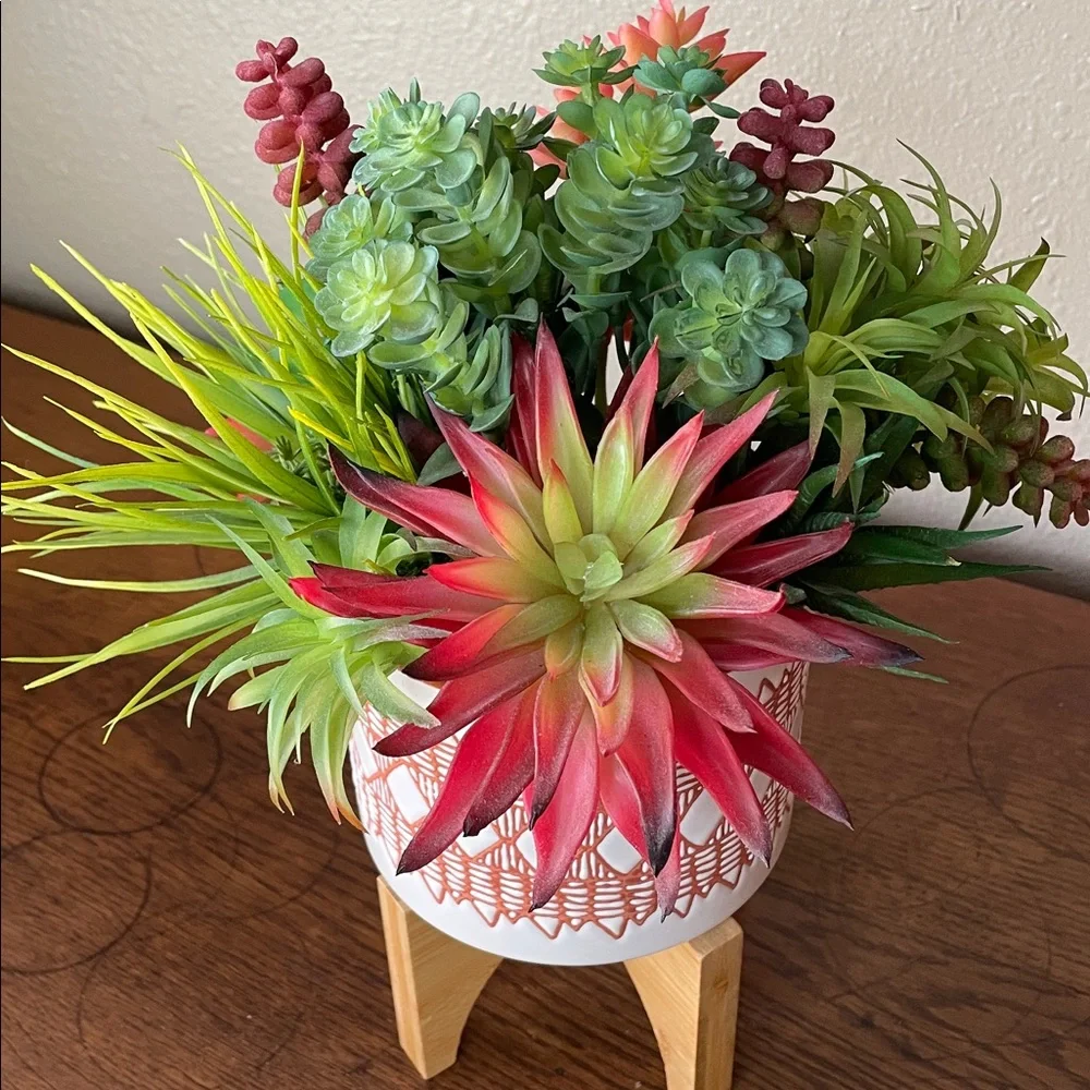 Contemporary Faux Succulent Mix in a Burnt Orange and White Ceramic Footed Vase